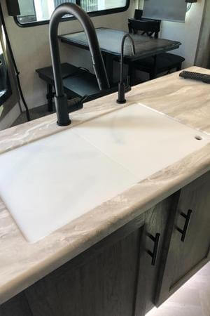 https://www.cuttingboard.com/product_images/uploaded_images/cuttingboard.com-blog-custom-sink-cover-cutting-board.jpg